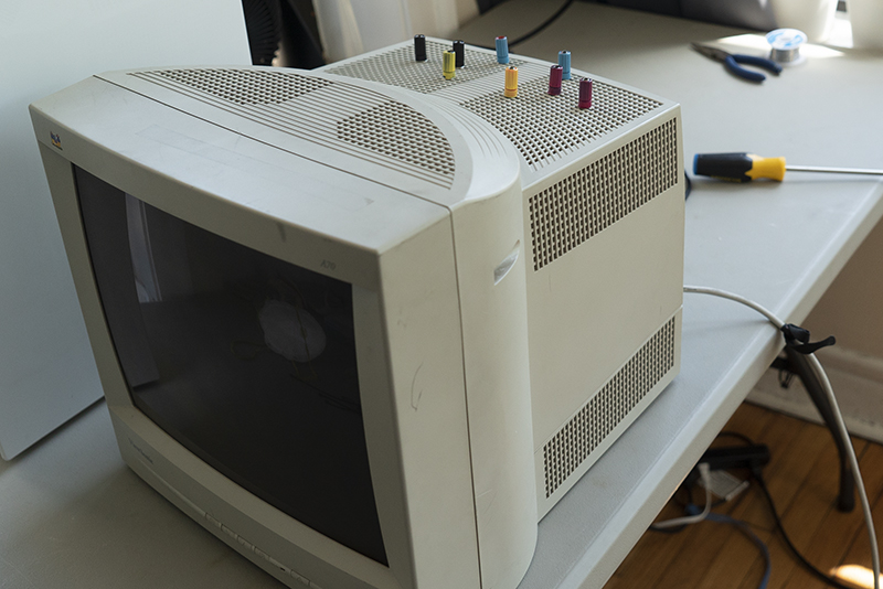 A CRT monitor closed with 8 color coded binding posts corresponding to the elecromagnets inside and in the above diagram