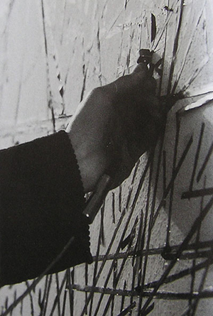 Detail of tape playhead being moved across electromagnetic tape for Nam June Paik's Random Access artwork.