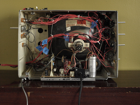 Modified Radio Shack TRS 80 with custom electronic wiring viewed from the back.
